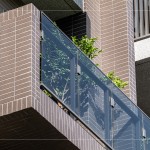 柔和溫潤的大地色系，不與環(huán)境爭艷，讓躍然於建築立面的大樹與植栽，成為最自然的表情。