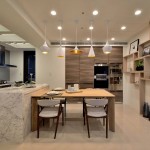 以米白色系為主調(diào)，稍加點綴的大理石紋、木色的溫潤雅致，猶如女主人般溫柔賢淑，入得了廚房也能出得了廳堂。